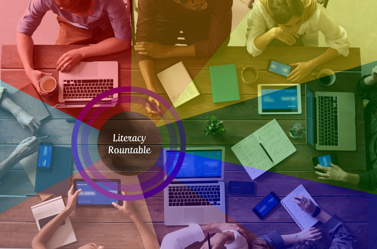 An image of people gathered at a table, connecting on their digital devices, and divided by a rainbow overlay, with a ripple effect in the centre reading "Literacy Roundtable"